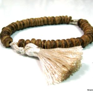 Bracelet bois pompon blanc cassé